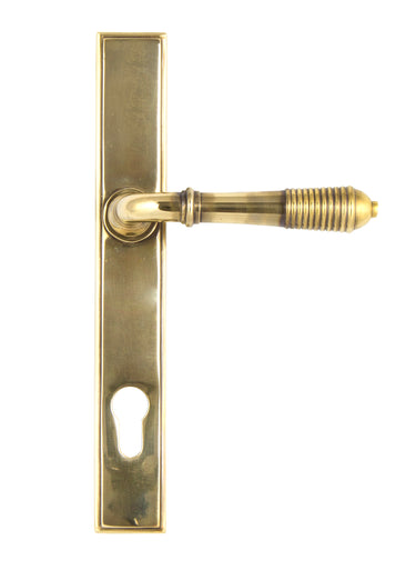 From The Anvil's Aged Brass Reeded Slimline Lever Espag. Lock Set; #finish_aged-brass