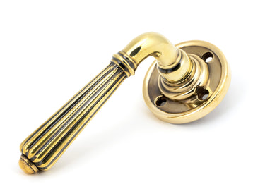 From The Anvil's Aged Brass Hinton Lever on Rose Set (Sprung); #finish_aged-brass