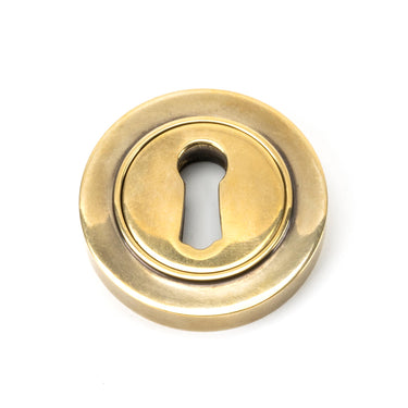 From The Anvil's Aged Brass Round Escutcheon; #finish_aged-brass