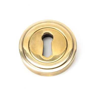 From The Anvil's Aged Brass Round Escutcheon; #finish_aged-brass