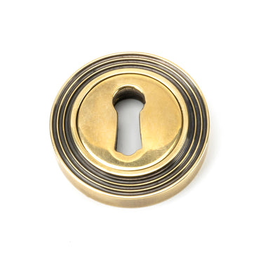 From The Anvil's Aged Brass Round Escutcheon; #finish_aged-brass