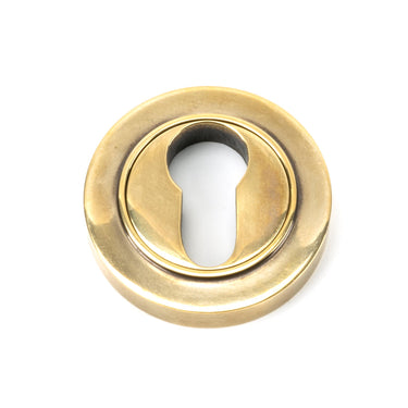From The Anvil's Aged Brass Round Euro Escutcheon; #finish_aged-brass