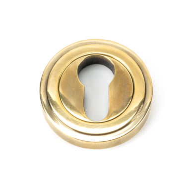 From The Anvil's Aged Brass Round Euro Escutcheon; #finish_aged-brass