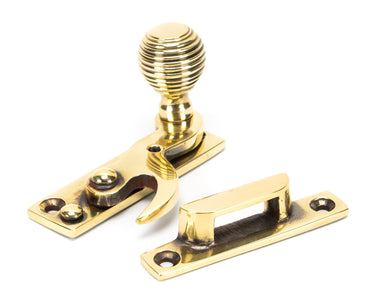 From The Anvil's Aged Brass Beehive Sash Hook Fastener; #finish_aged-brass