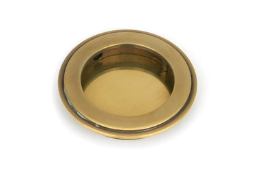 From The Anvil's Aged Brass Art Deco Round Pull; #finish_aged-brass
