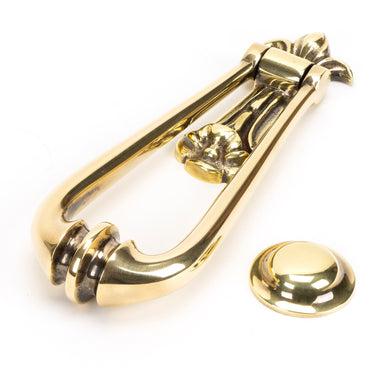 From The Anvil's Aged Brass Loop Door Knocker; #finish_aged-brass
