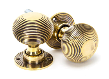From The Anvil's Aged Brass Beehive Mortice/Rim Knob Set; #finish_aged-brass