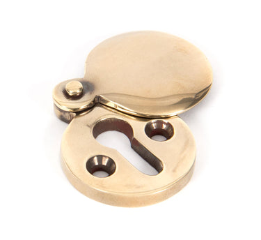 From The Anvil's Aged Brass 30mm Round Escutcheon; #finish_aged-brass