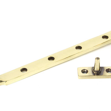 From The Anvil's Aged Brass Reeded Stay; #finish_aged-brass