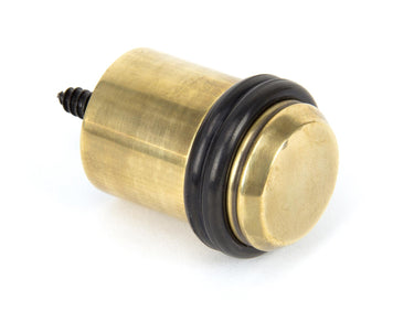 From The Anvil's Aged Brass Floor Mounted Door Stop; #finish_aged-brass