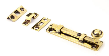 From The Anvil's Aged Brass Universal Bolt; #finish_aged-brass