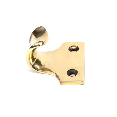From The Anvil's Aged Brass Sash Lift; #finish_aged-brass