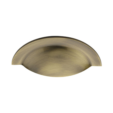 M Marcus - Heritage Brass - Crescent Drawer Cup Pull - 57mm CTC; #finish_antique-brass