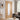 PM Mendes - Oak Corsica door with clear glazed panel, decorative crown-cut veneer, and V grooves.; #finish_pre-finished-oak