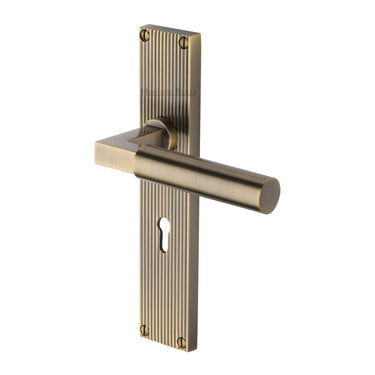M Marcus - Heritage Brass - Bauhaus Reeded Door Handles - Lock - Pair; #finish_antique-brass