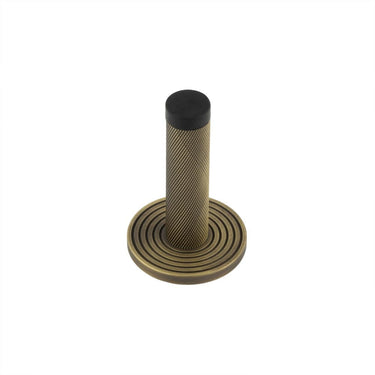 Frelan Hardware - Burlington Knurled Wall Mounted Door Stop - Reeded Rose; #finish_antique-brass