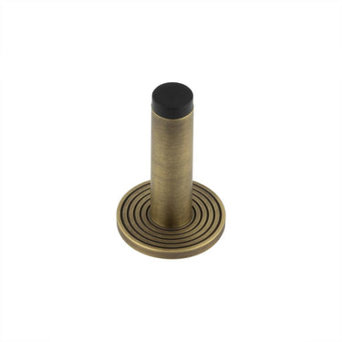 Frelan Hardware - Burlington Plain Wall Mounted Door Stops - Reeded Rose; #finish_antique-brass